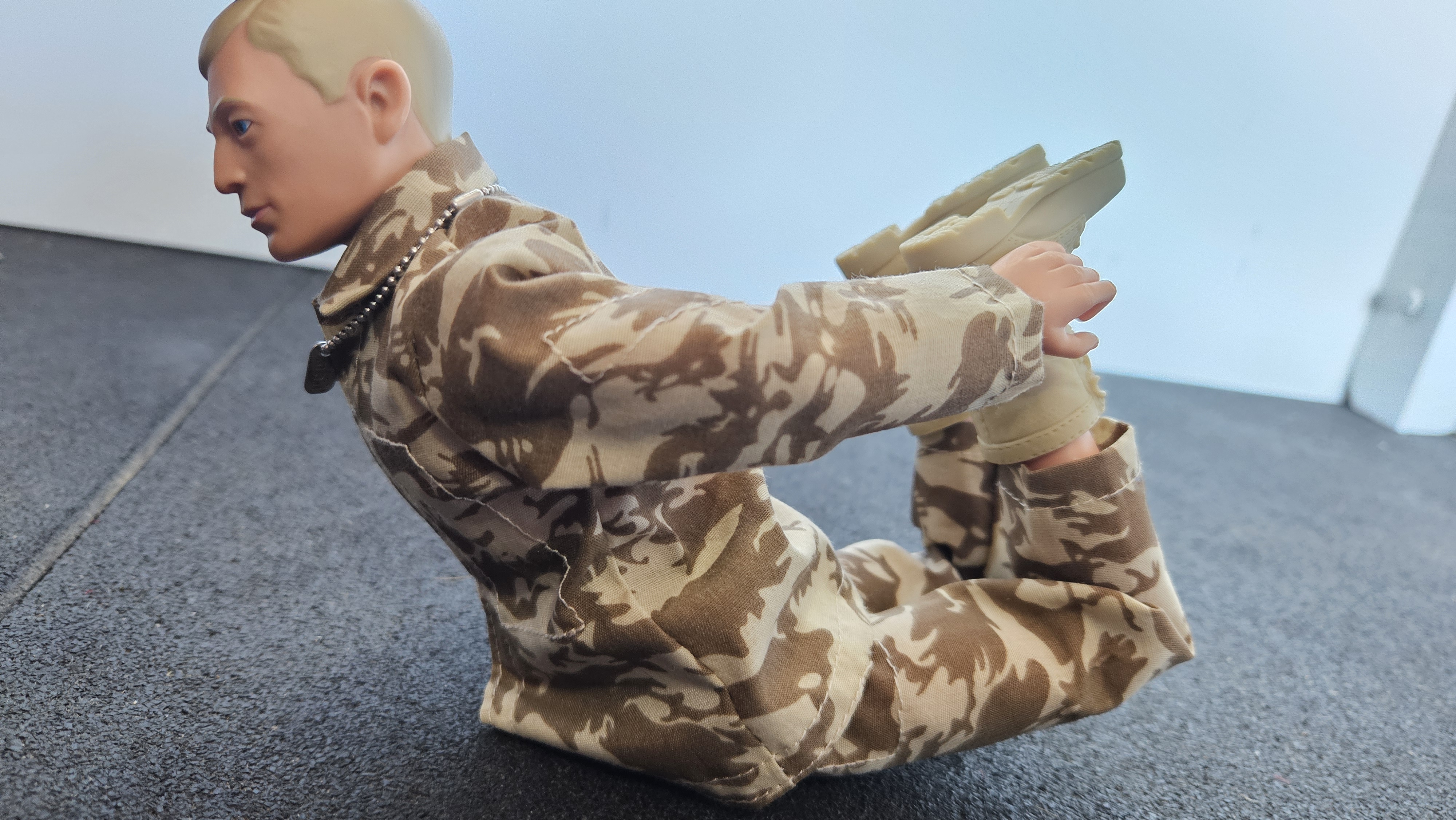 Action Man doing Bow Pose